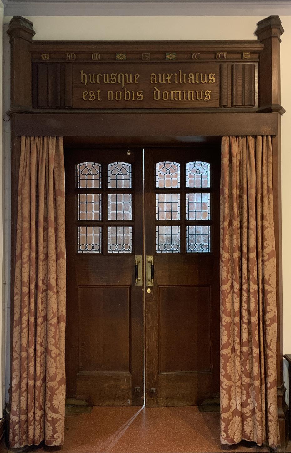 The Chapel door with the inscription above it, photographed by Hannah Sargent (Communications Officer 2013), 2020 (archive reference: GCPH 2/4/17).