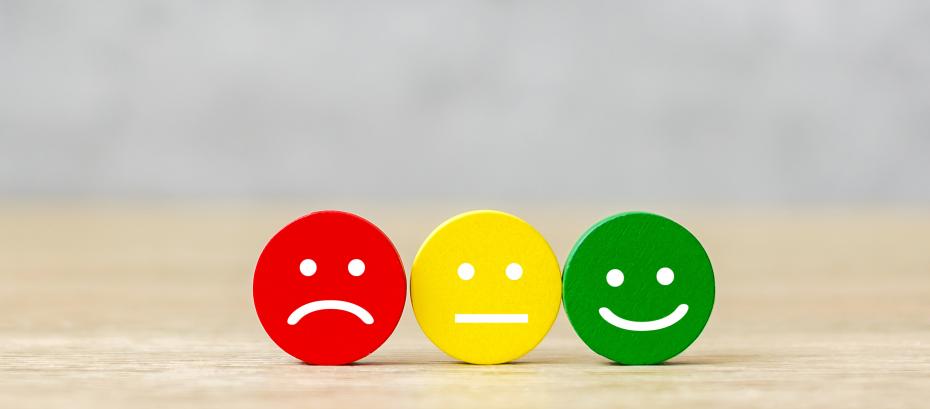 3 face icons: 1) red with sad face 2) yellow with neutral face 3) green with happy face
