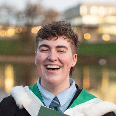 J. in graduation dress.