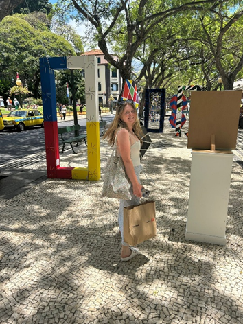Megan on holiday in the middle of a street art installation