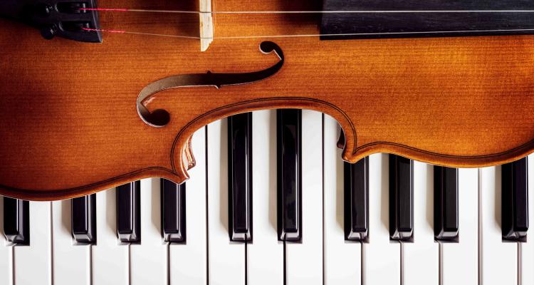 violin on piano keys