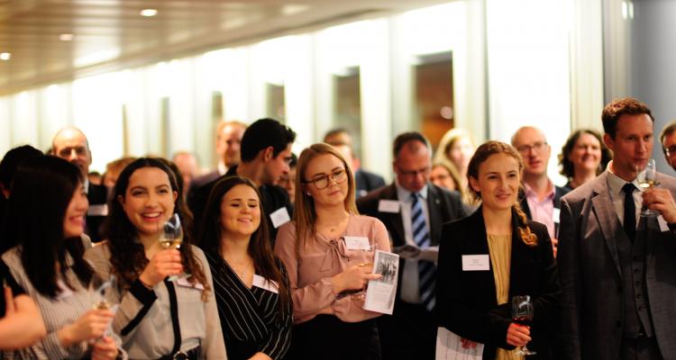 Image of audience at drinks reception