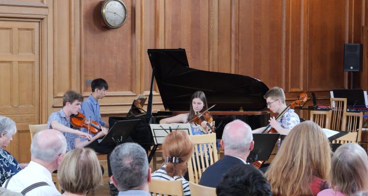 Students performing in Great Hall at the GCMS May Week Concert 2025