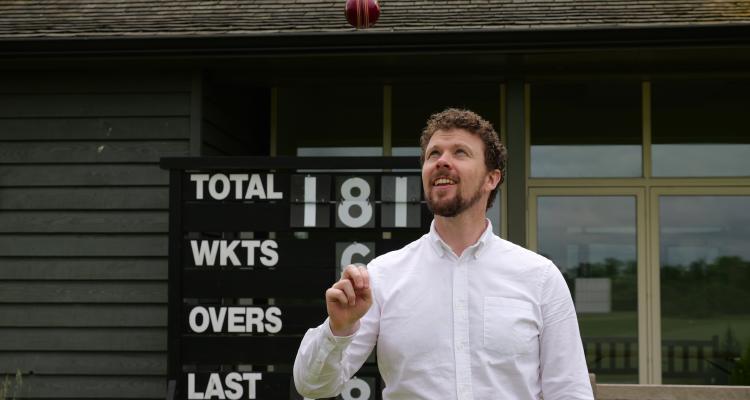 Dr Sam Grimshaw, throwing a cricket ball