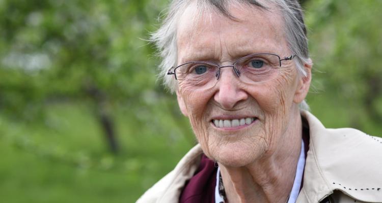 Dr Gillian Jondorf in Girton College orchard