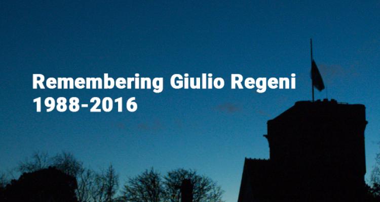 Girton College Tower with a flag flying at half-mast with the text Remembering Giulio Regeni 1988-2016