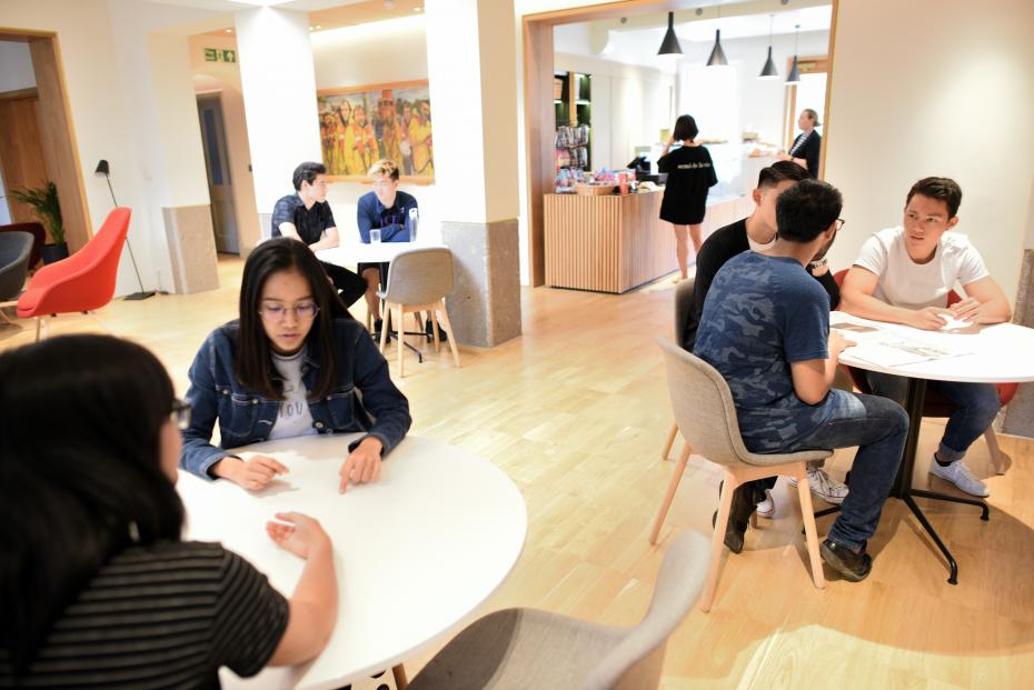 Students sitting in Social Hub