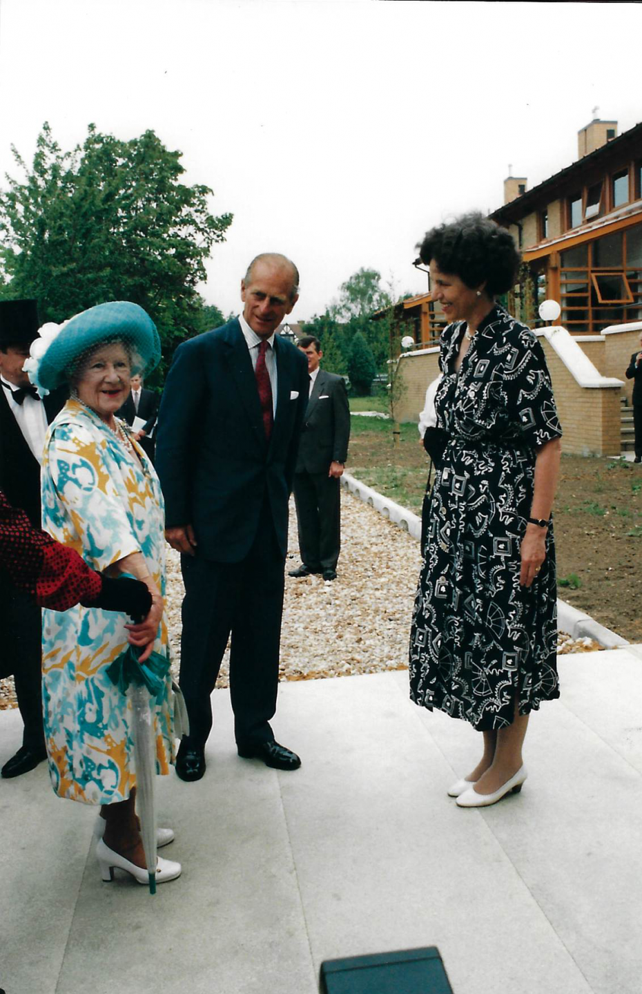 The Queen Mother and The Duke of Edinburgh, Prince Philip, arriving at Wolfson Court in June 1993, greeted by former Mistress, Ms Juliet Campbell (Archive Reference: GCPH 12/1/11, photographer unknown).