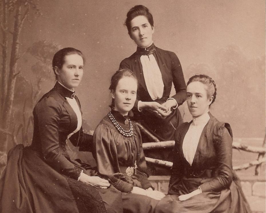 Henrietta Jex-Blake (standing); Violet Buxton, née Jex-Blake, Adela Kensington and Katharine Jex-Blake (seated, l-r), taken by J[?] Hartmann of Bayreuth, 1889 (archive reference: GCPH 5/8/4). Violet and Henrietta were two of Katharine’s eight sisters. Adela Kensington, later Mrs Adam, was a student at Girton 1885–89, (when she would have been taught by Katharine), later a Staff Lecturer in Classics, and a Cassel Research Fellow.