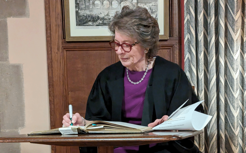 Professor Dame Lesley Regan signing the College Register