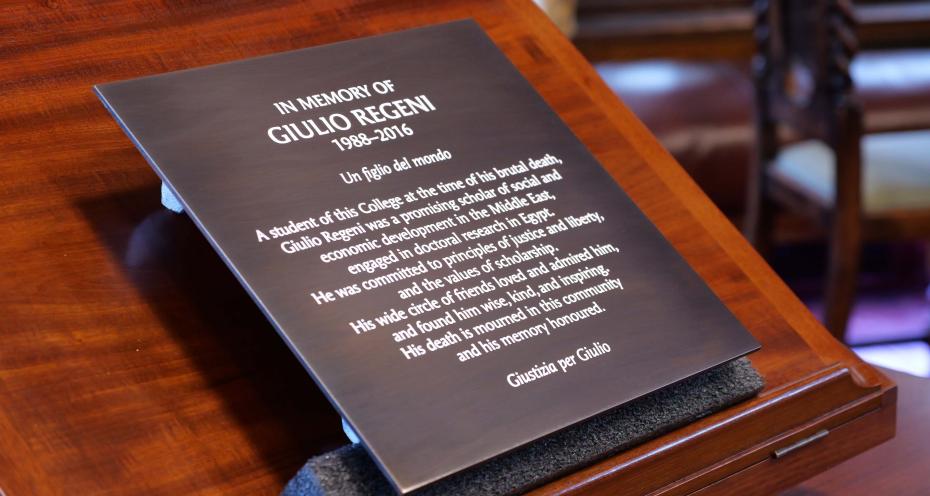 Close up of the plaque resting on a easel in the Stanley Library, Girton College