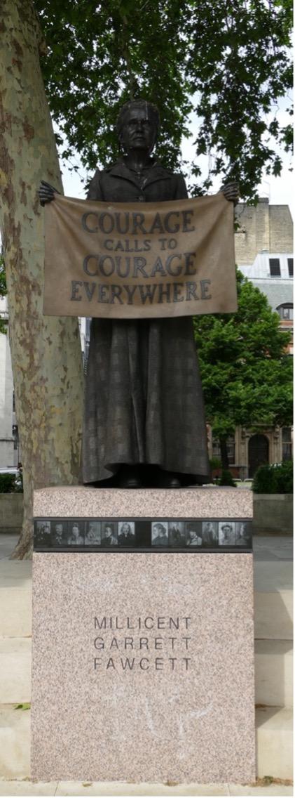 A statue of Millicent Fawcett in Parliament Square. Helen Blackburn is pictured on the plinth.