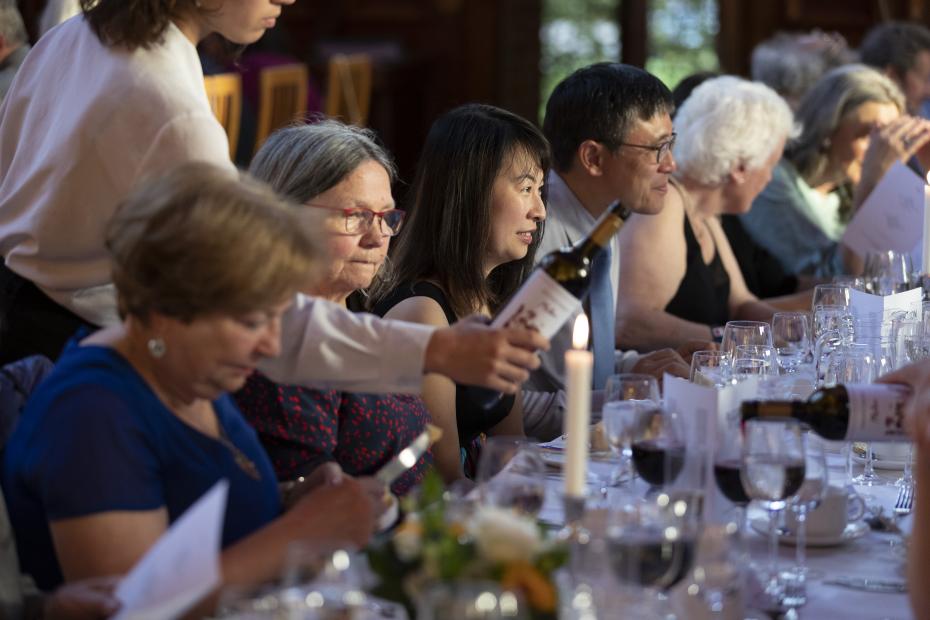 Alumni and supporters sitting down for dinner